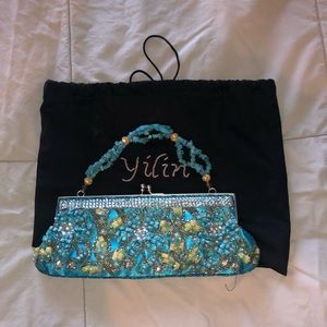 Yilin hand embroidered and beaded clutch